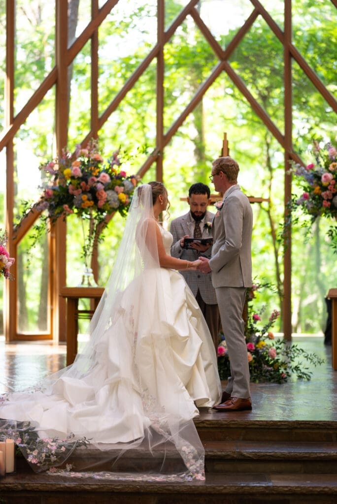 Bride and groom at Anthony Chapel ceremony. Wedding photographers near me