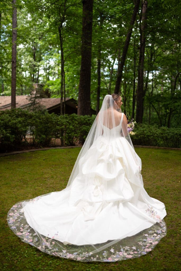 Full bridal dress dress portrait at Anthony Chapel, Arkansas. Shot true to color editorial by Maddie, a Wisconsin true to color wedding photographer