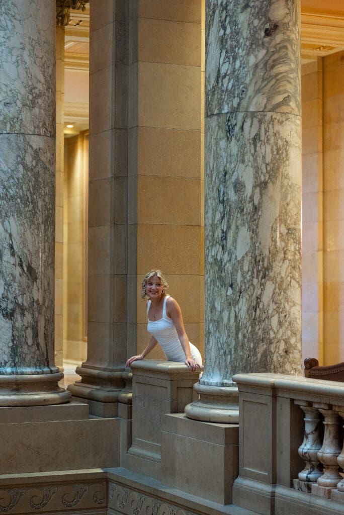 Romeo and Juliet style engagement photo at the MN State Capitol engagement session in St. Paul, MN. True color wedding photos by Maddie from Spirited Sage Photography, a Wisconsin wedding photographer