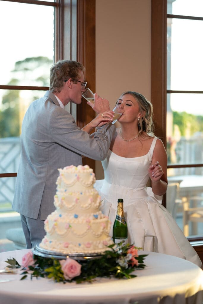 champagne and cake cutting wedding photos