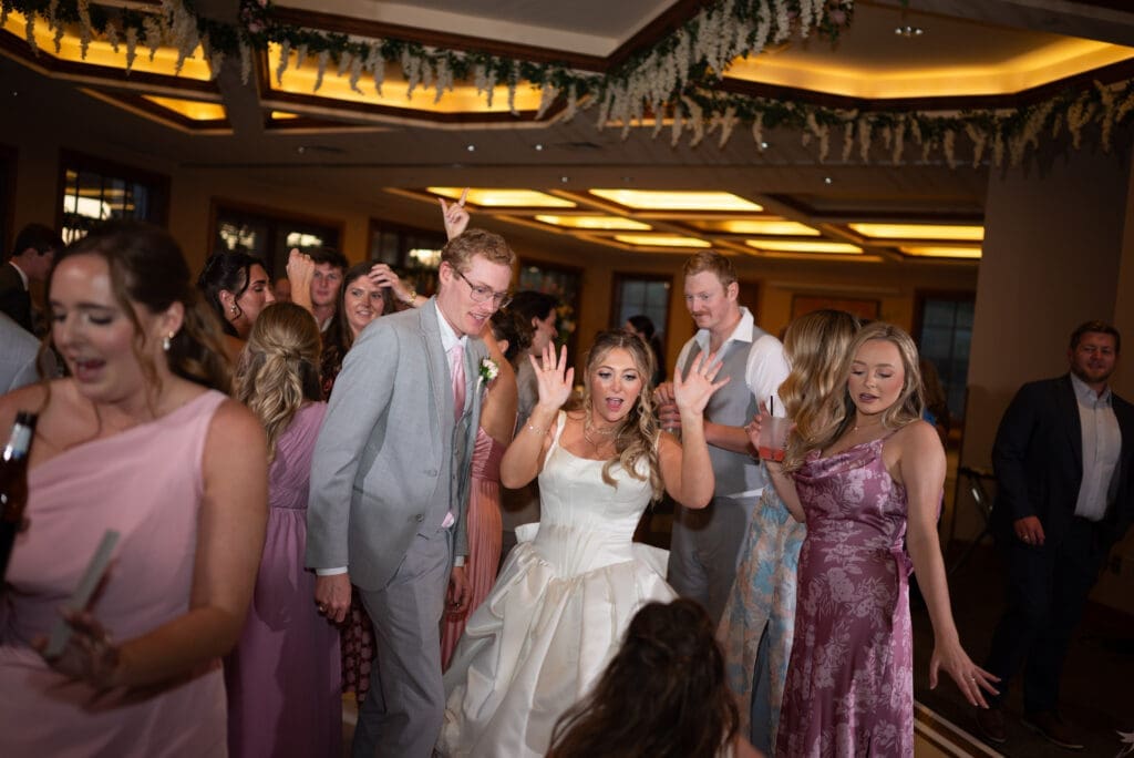Wedding Shot list didn't include fun flash dance floor photos, but this western Wisconsin photographer captured the moment.