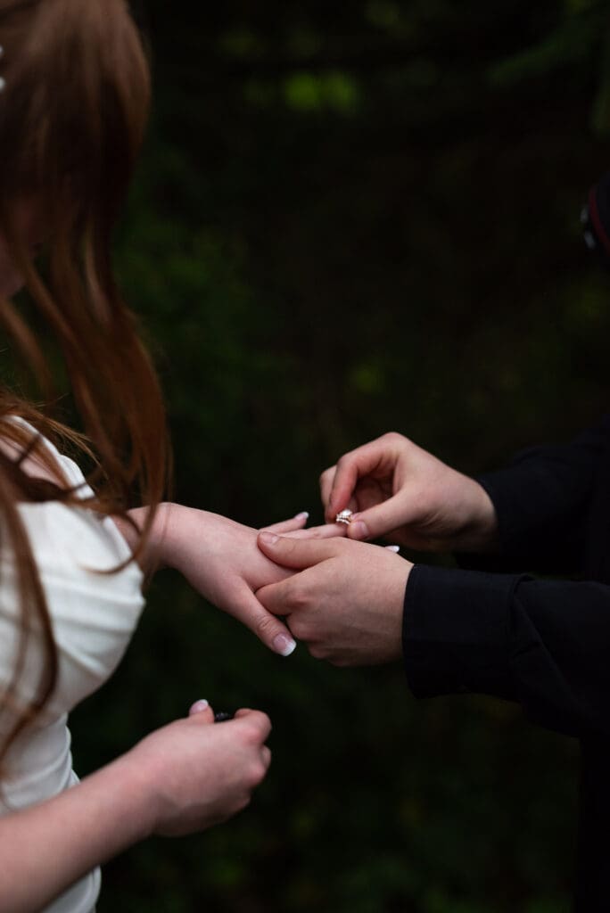 putting ring on bride's finger la crosse wisconsin wedding