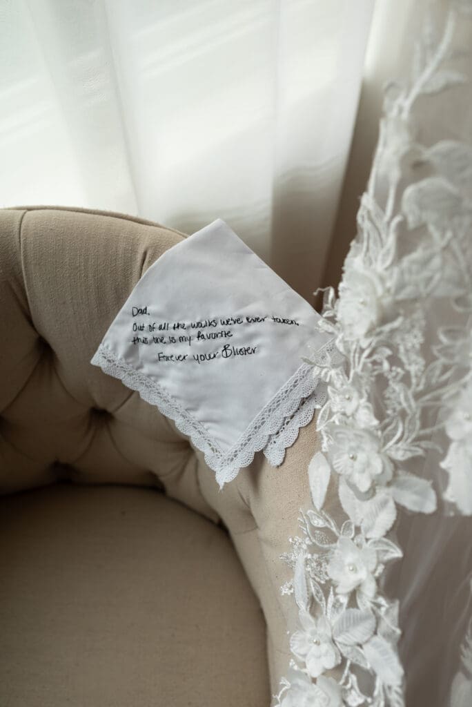 handwritten handkerchief to father of the bride. la crosse wedding photographer