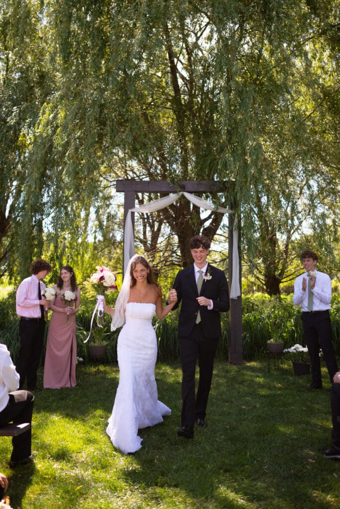 walking down the aisle at pepin wedding venue