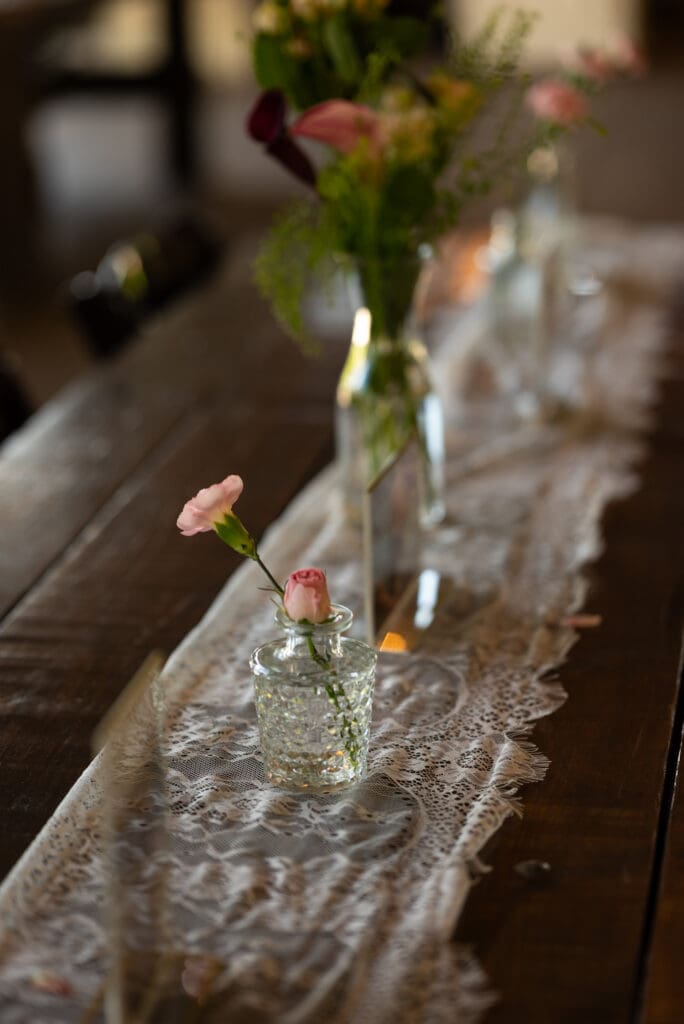 wedding table centerpieces. natural true color wedding photographer near Pepin, WI