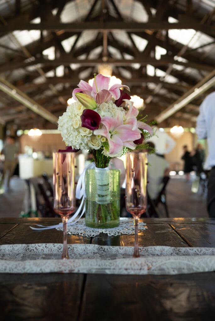 head table and flowers. Pepin wedding photographers still available for 2026