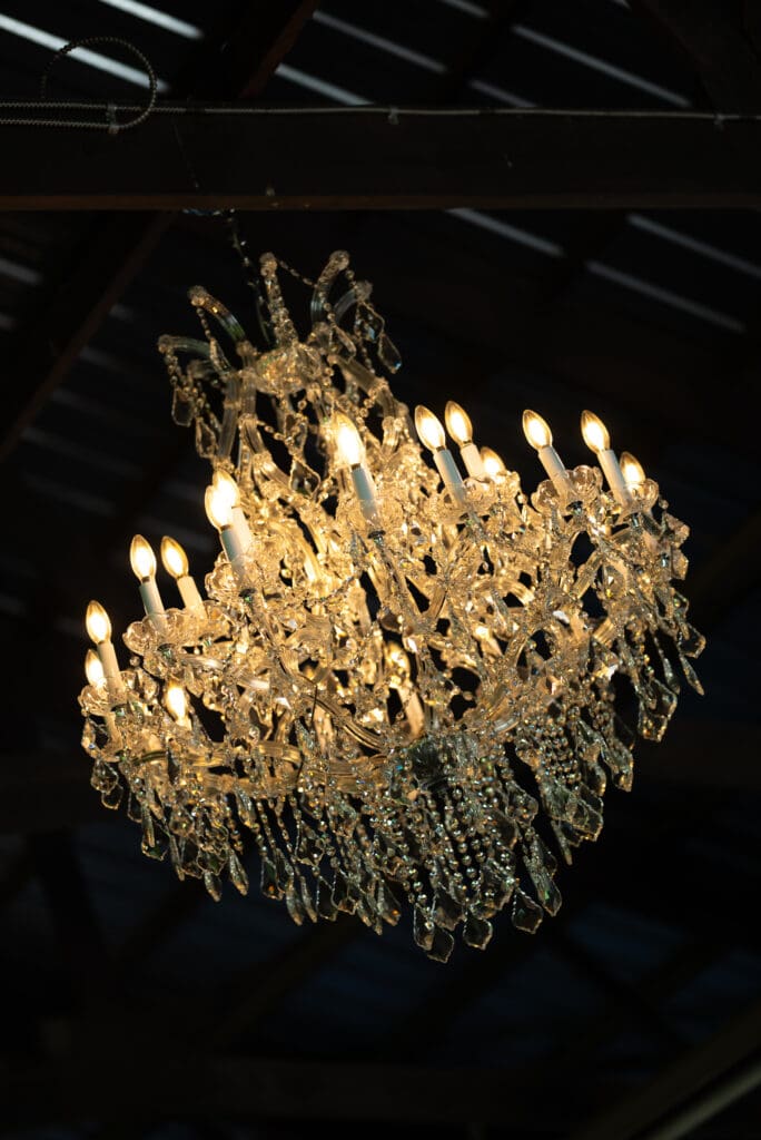 hidden meadow and barn chandelier. Maddie is a Wisconsin wedding photographer with 2026 dates still available and 2027 dates open too.