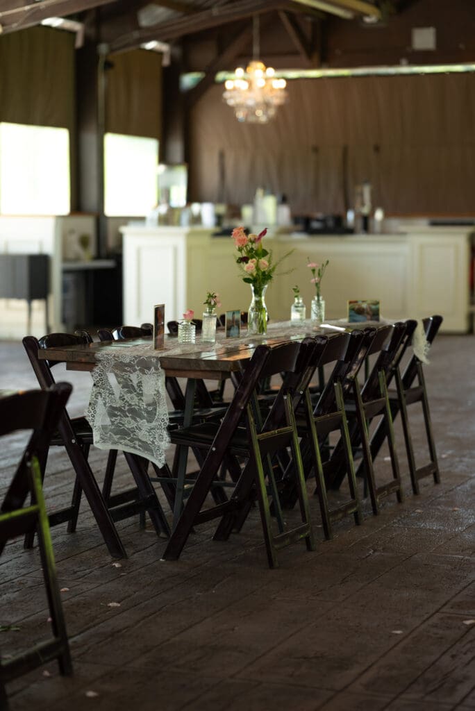 hidden meadow and barn ceremony space and table layout. Pepin wisconsin wedding photographer