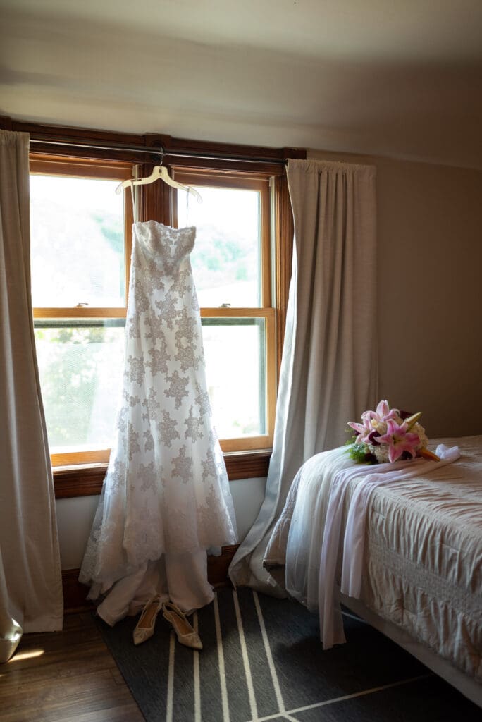 Wedding dress detail photo at hidden meadow and barn in Pepin, WI. True to color wedding photographer near me