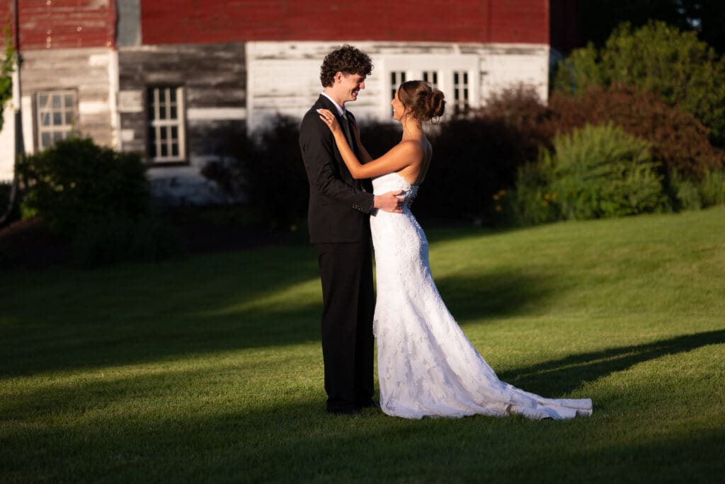 bride and groom portrait during golden hour at pepin wedding venue hidden meadow and barn
