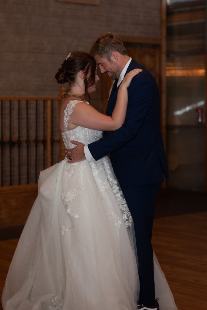 bride and groom dancing