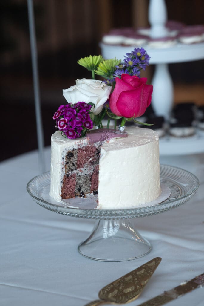 gorgeous wedding cake with flowers on top