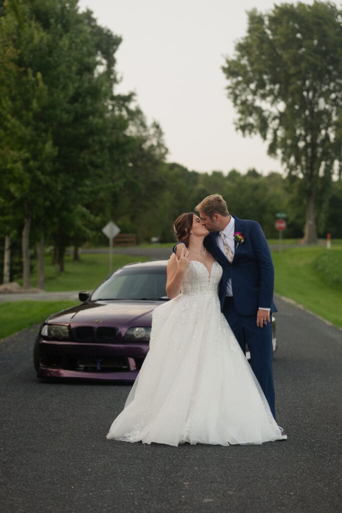 Include fun and personal portraits, like this one including their car in their wedding photos, for character in your wedding photos.