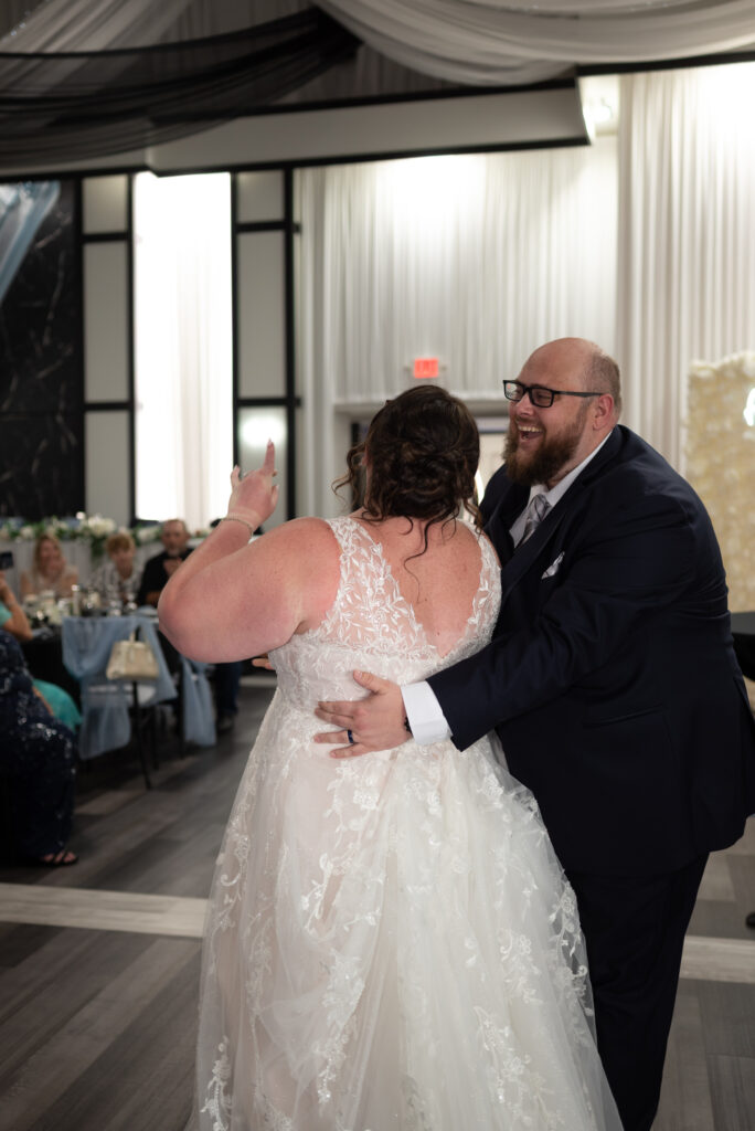 grand entrance at wedding captured by Maddie, from Spirited Sage Photography