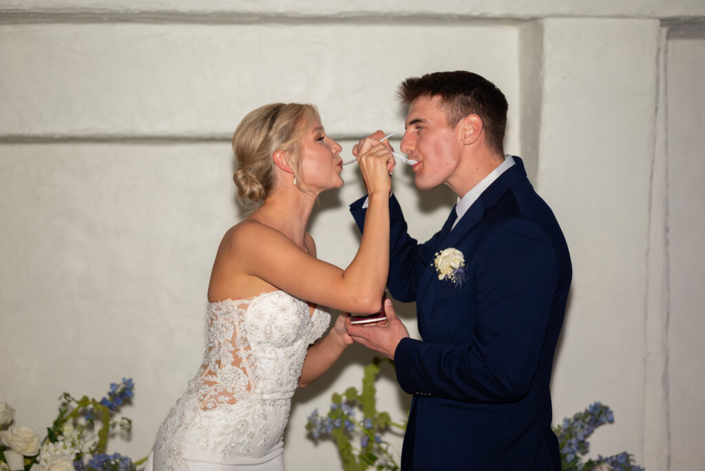 Fun shots with unique moments are something worth mentioning on your shot list. This Wisconsin wedding couple had Olson's Ice Cream cart at their wedding and it made for some super fun wedding photos!