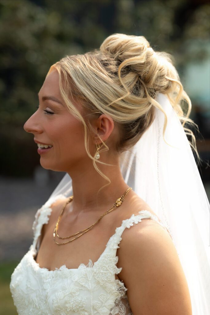 Bride side profile portrait showing off her beauty and jewelry before their mountain micro wedding