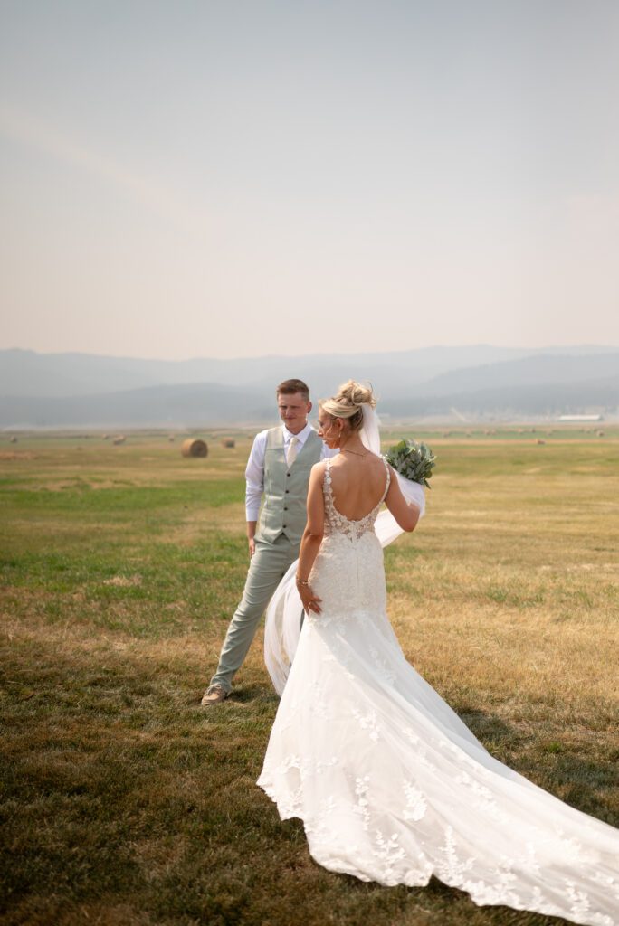 Candid shot of bride and groom at their Montana AirBnB ceremony space