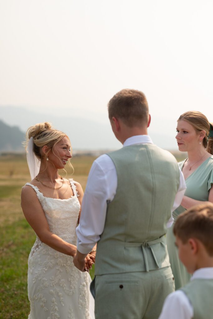 Exchanging vows at Montana micro wedding 4p AirBnB