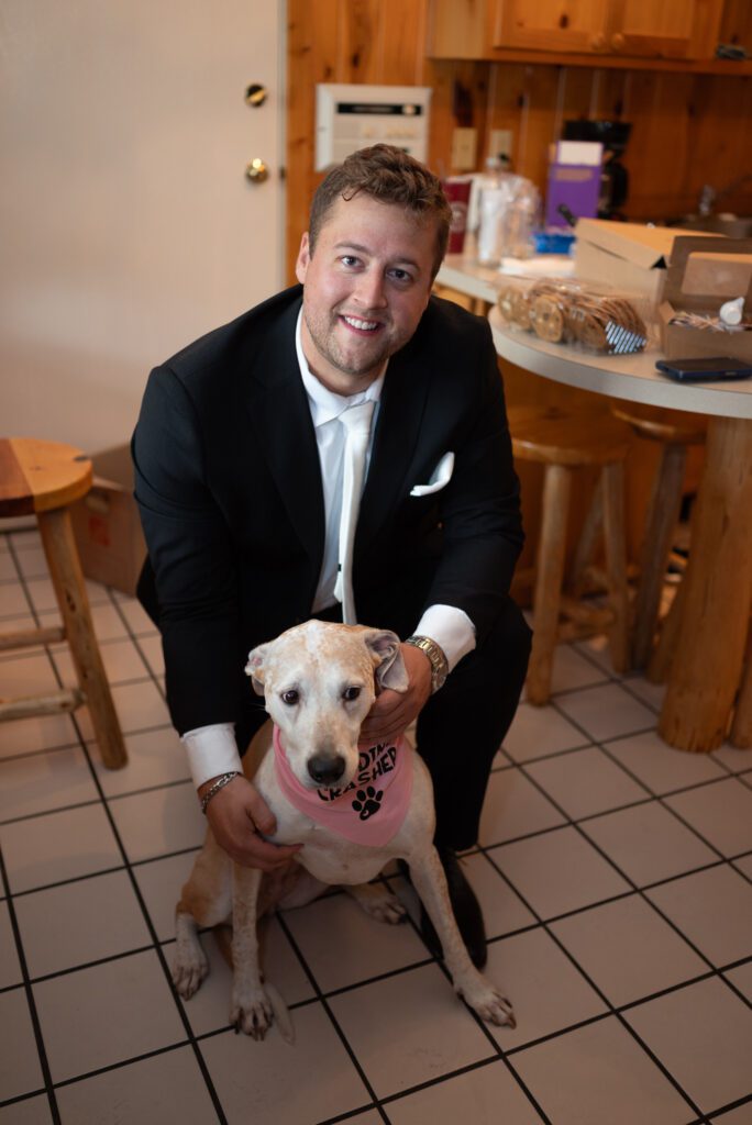 groom and dog