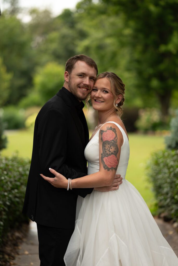 Bride and groom wedding portrait at garden wedding venue in western wisconsin