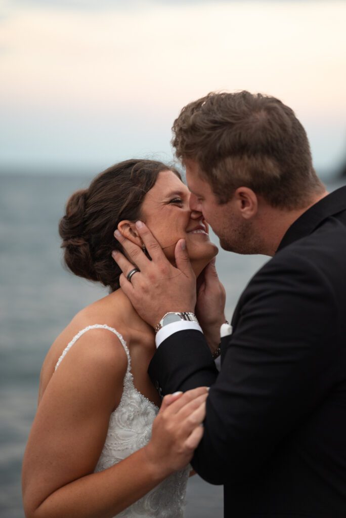 Groom kissing bride