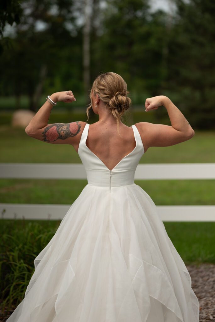 Bride showing off her muscles