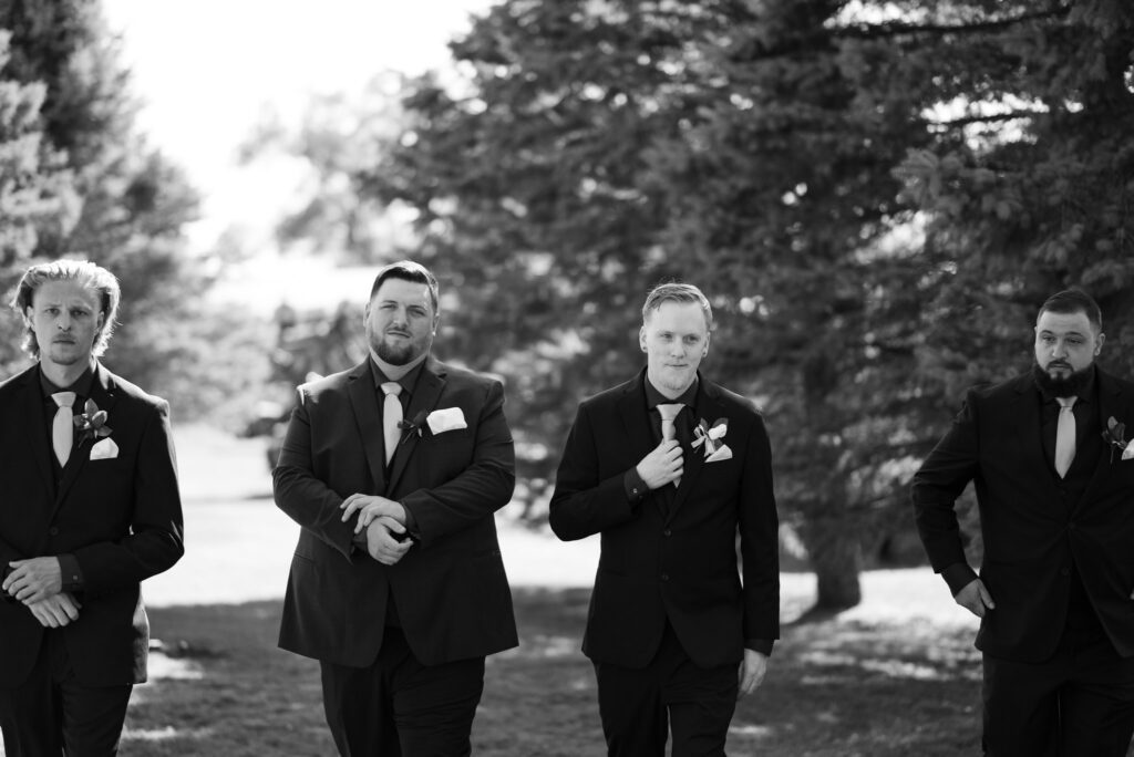editorial shot of groom and groomsmen