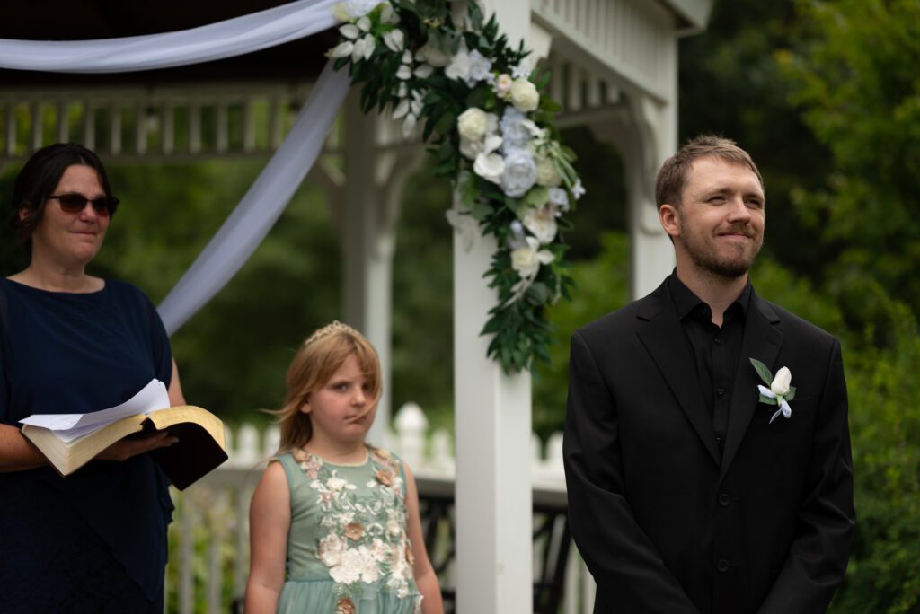 waiting for bride to walk down aisle