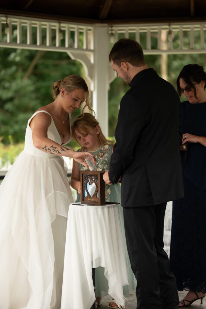 pouring sand at Blooming barrel wedding ceremony