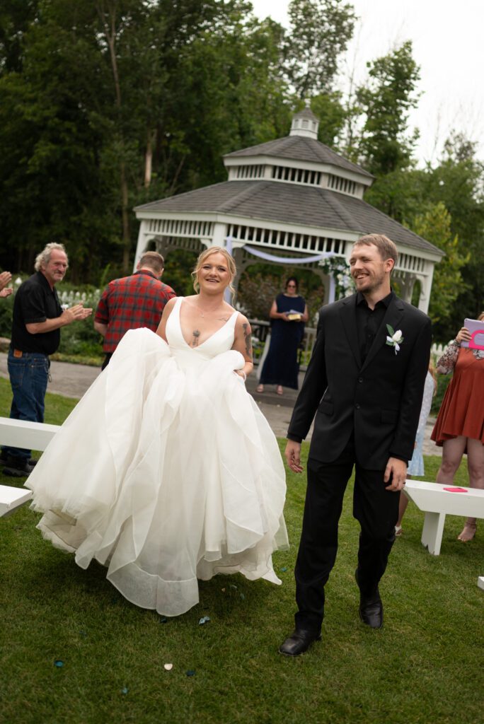 walking down the aisle at Blooming barrel Baldwin, WI