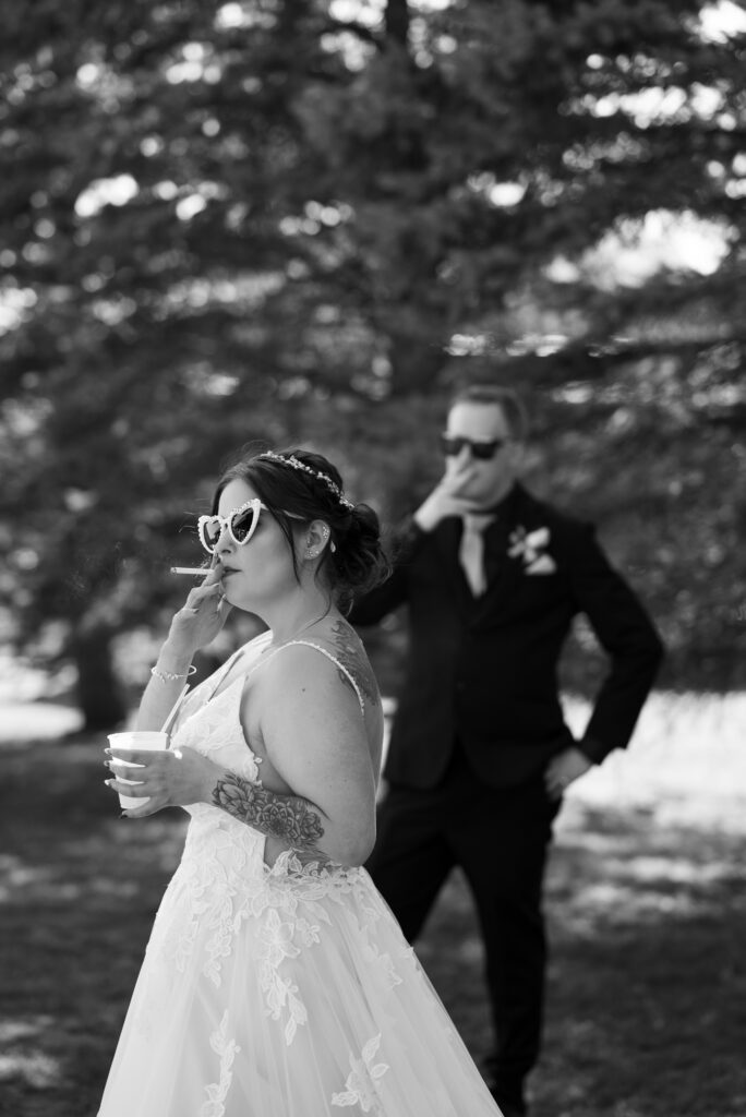 non-traditional wedding editorial wedding photographer bride and groom enjoying a smoke before their wedding