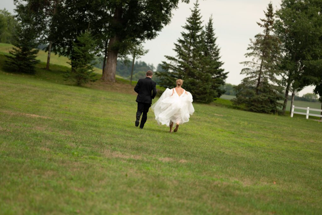 Couple running at Blooming Barrel in Baldwin, WI