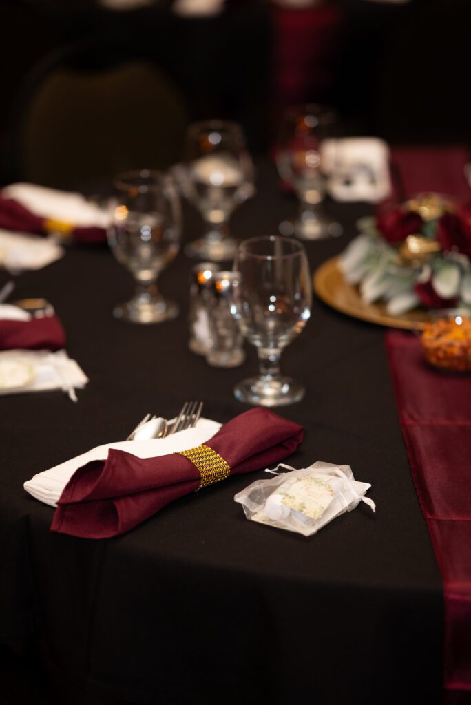 red and black wedding table set up