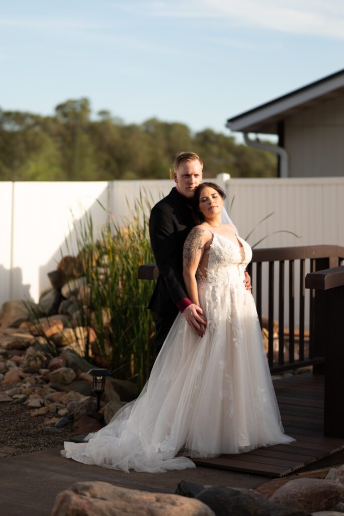 bride and groom portrait at bluff bar and grill