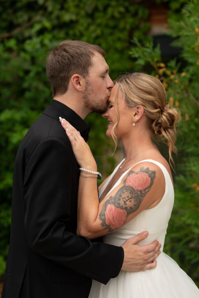 wedding portrait in front of ivy