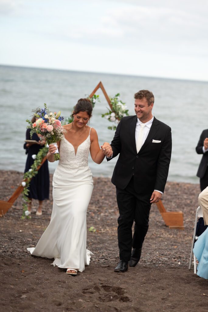 bride and groom walking down the aisle