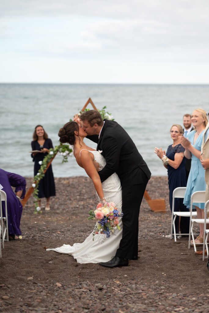 dip and kiss coming back up the aisle