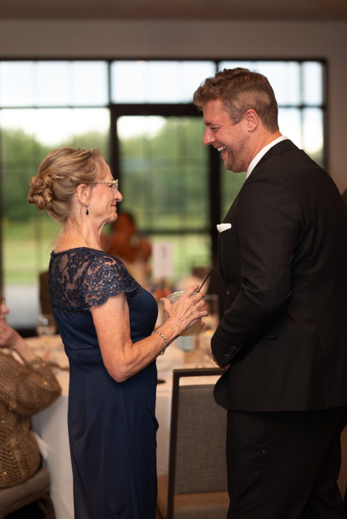 groom talking with his mom