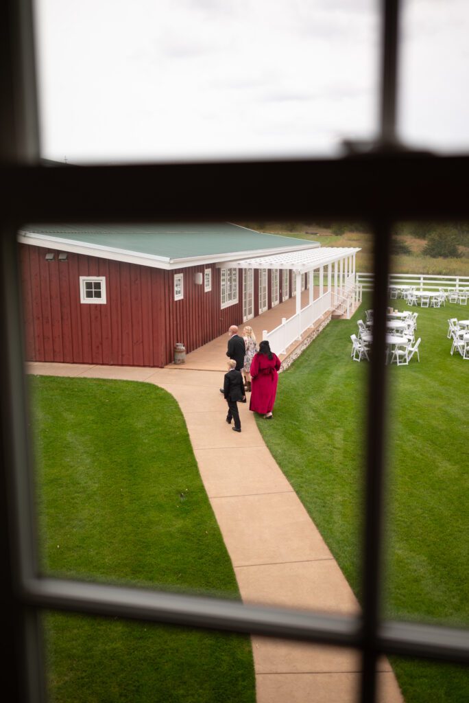family walking around venue before ceremony