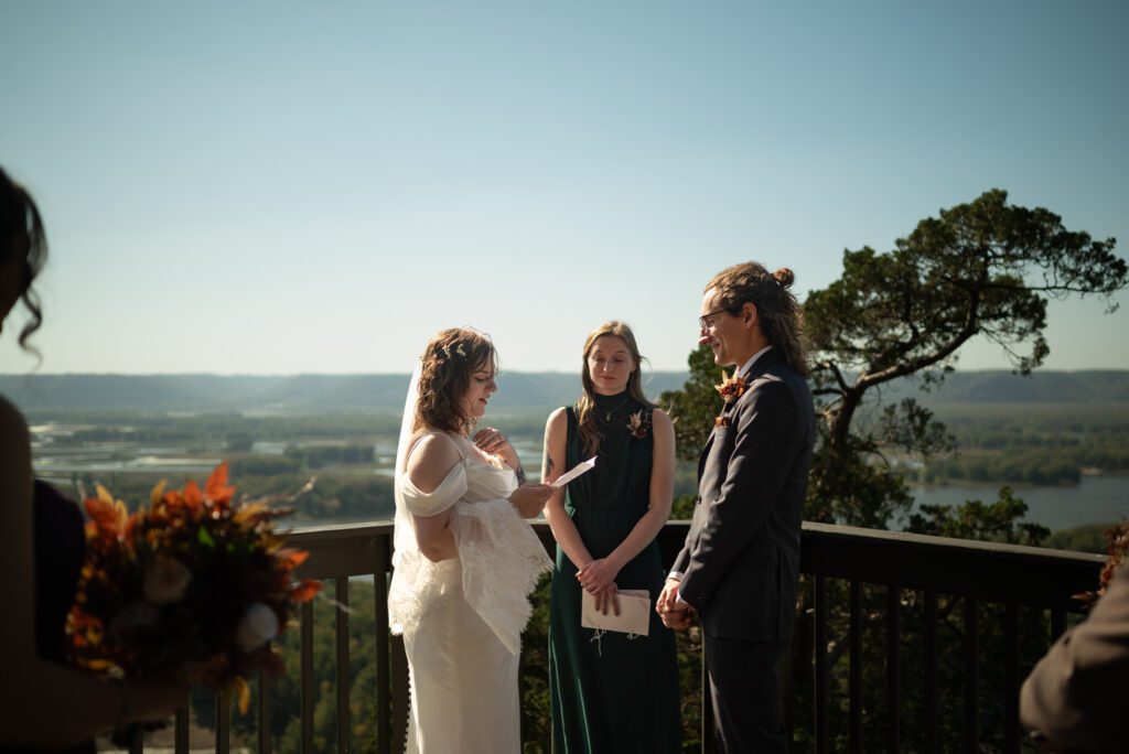 micro wedding ceremony at De Soto AirBnB photographed by Spirited Sage Photography, a true to color wedding photographer