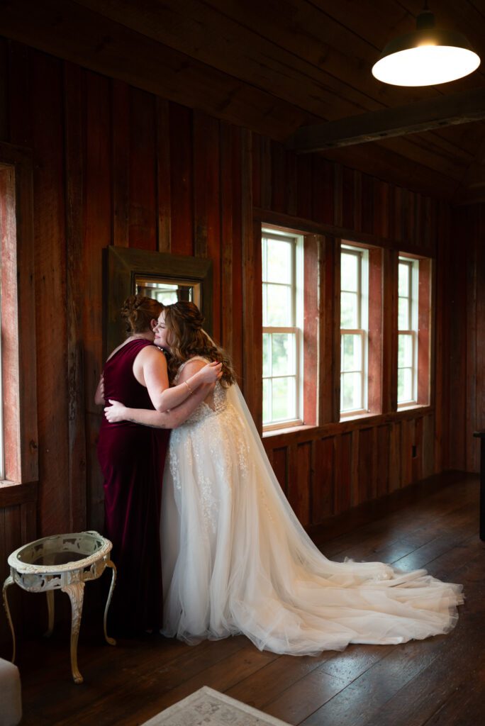 bride hugging sister