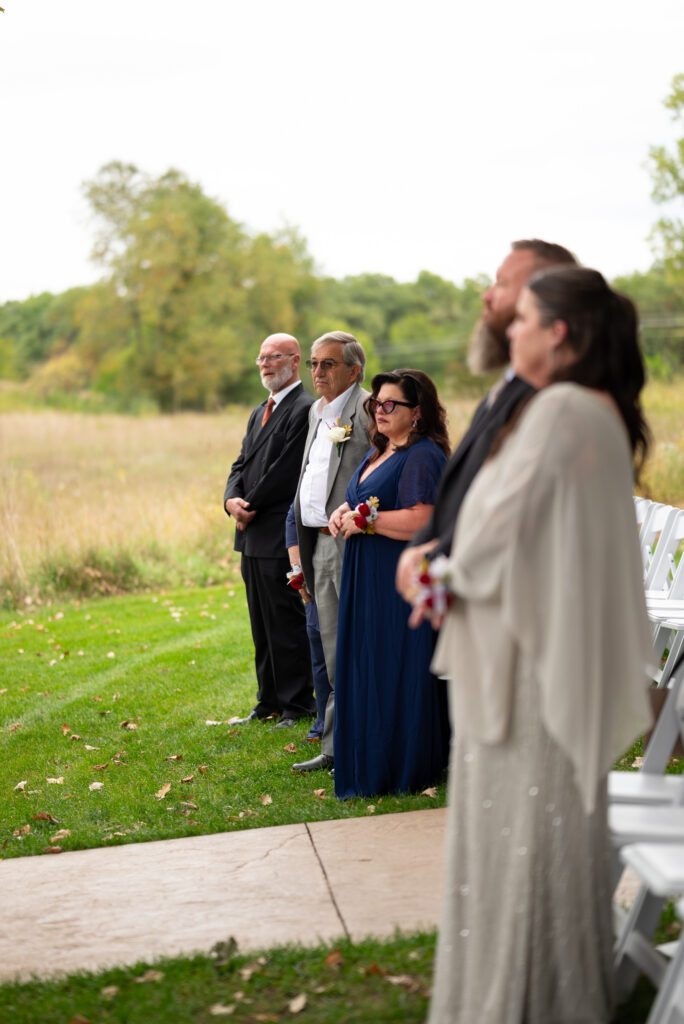 family of bride and groom watching