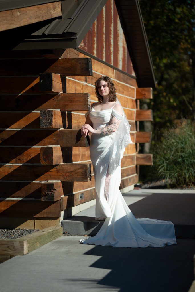 bride standing by cabin