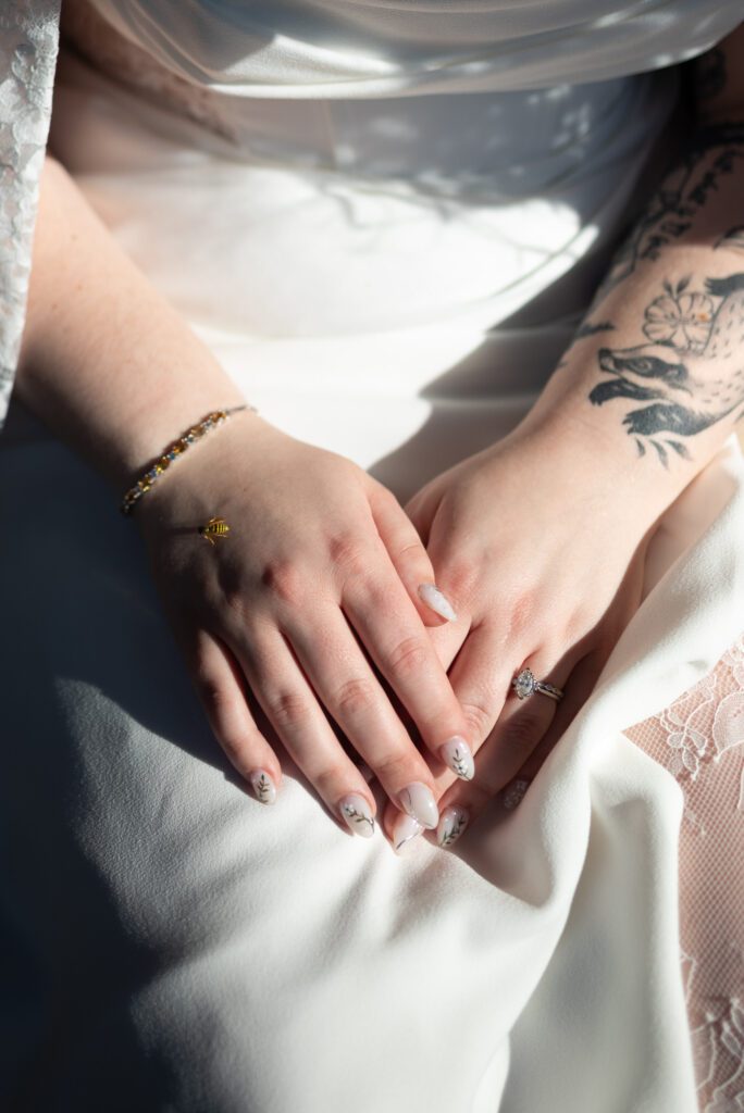 bee on bride's hand