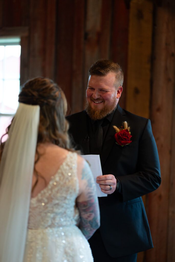 bride and groom private vows indoors at Almquist farm in Hastings, MN