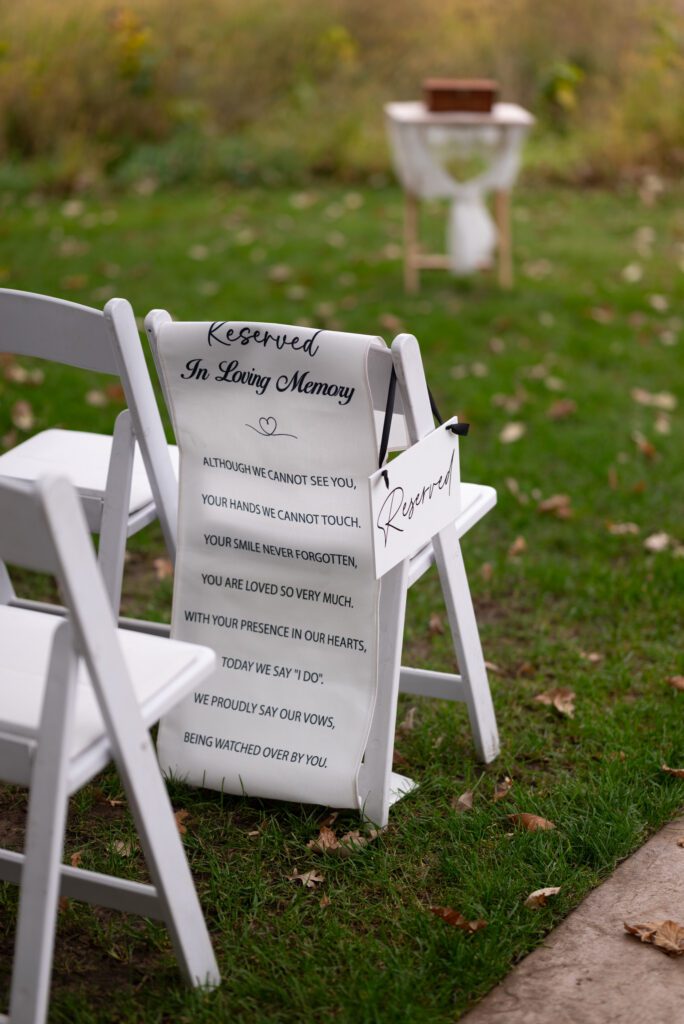 chair with sign on the back showing it's reserved