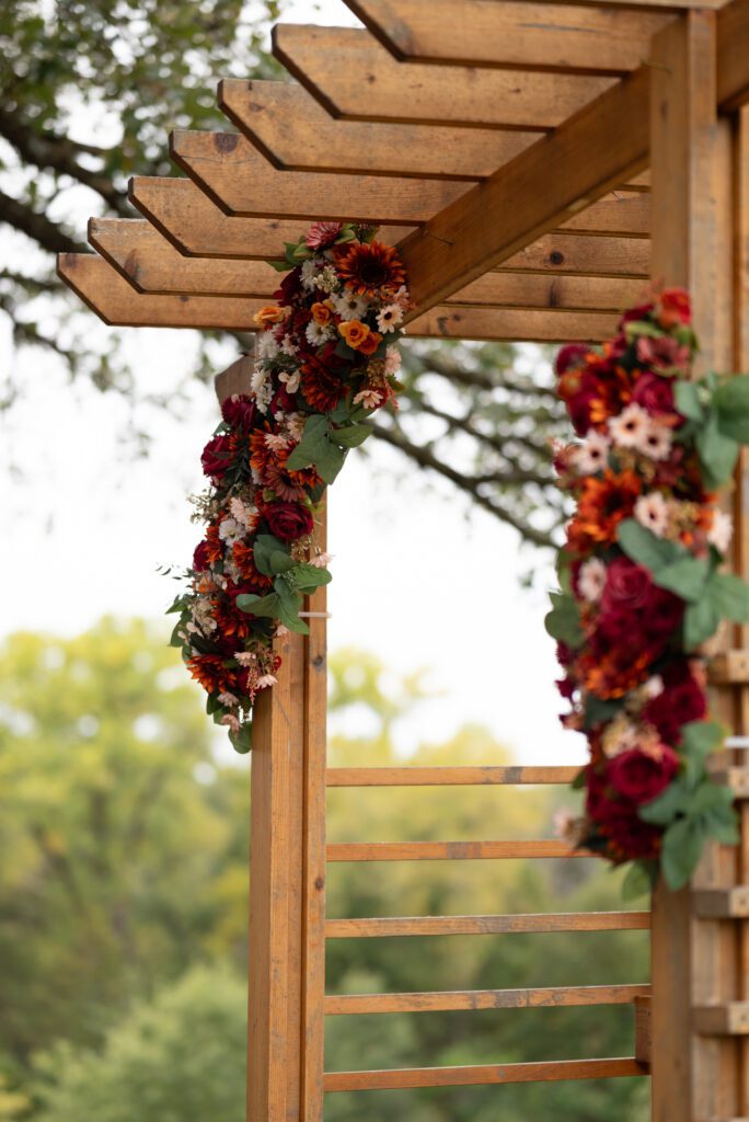 pergola with wedding florals